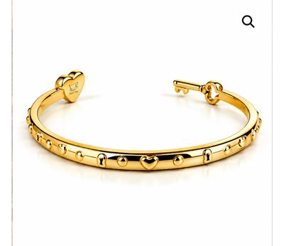 Bracciale rigido color oro chiave e serratura di Wonderland Tutto è possibile Mad Tea