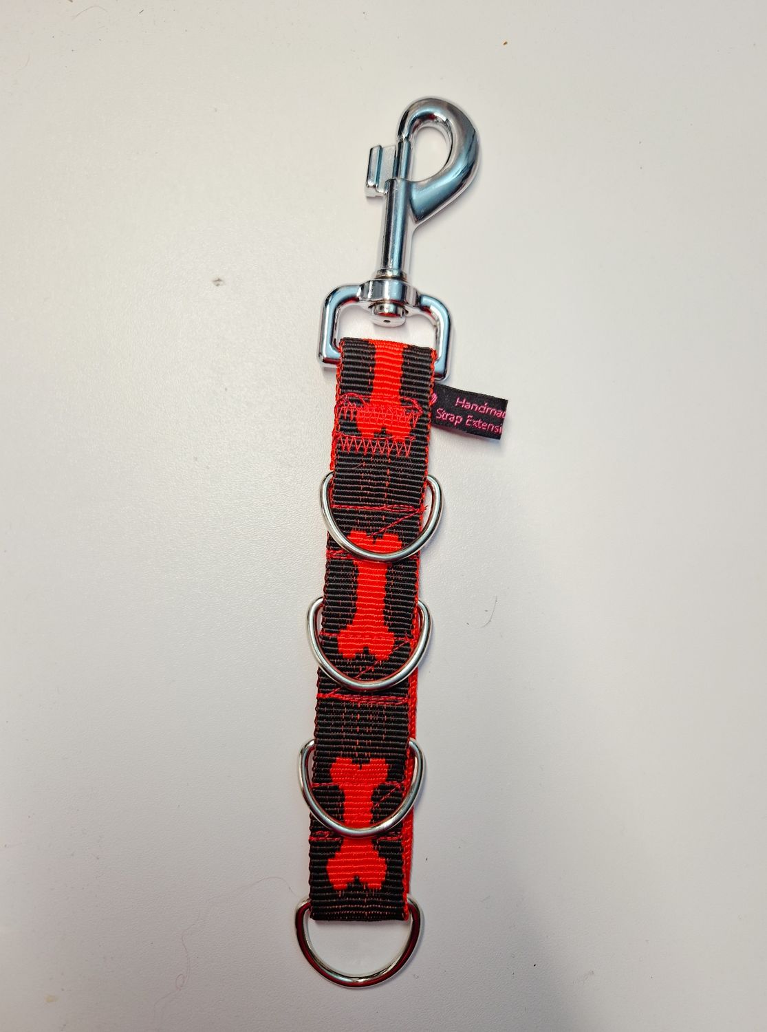 Galgenverlängerung Strap Extension Knochen schwarz rot 4 D-Ringe Galgenverlängerung Strap Extension Knochen schwarz rot 4 D-Ringe