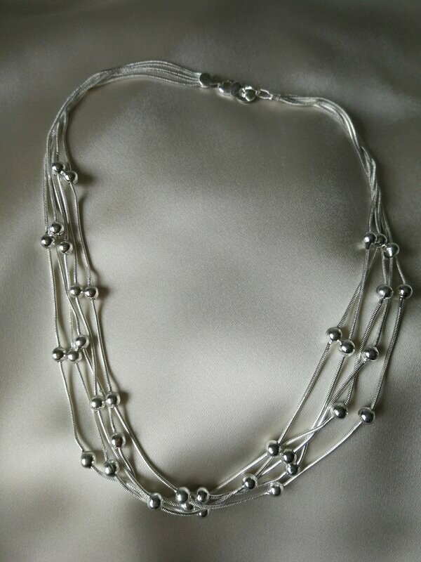 COLLAR CON BOLAS EN PLATA 925