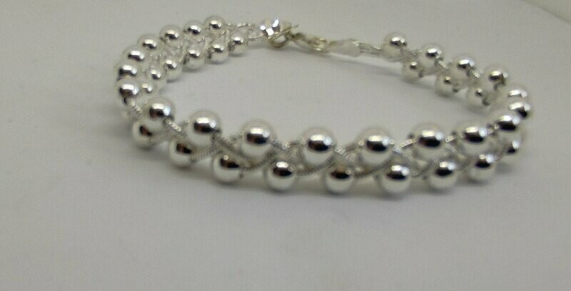 PULSERA BOLITAS DE PLATA.