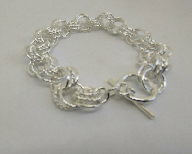 PULSERA MIL ARITOS.