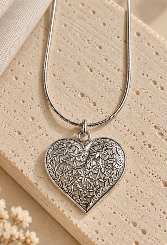 COLGANTE MITAD DE CORAZÓN, Plata 925