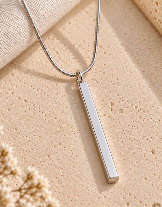 Colgante lingote de plata.