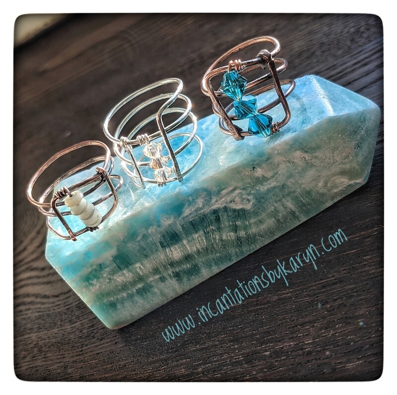 Copper and sterling silver snake rings