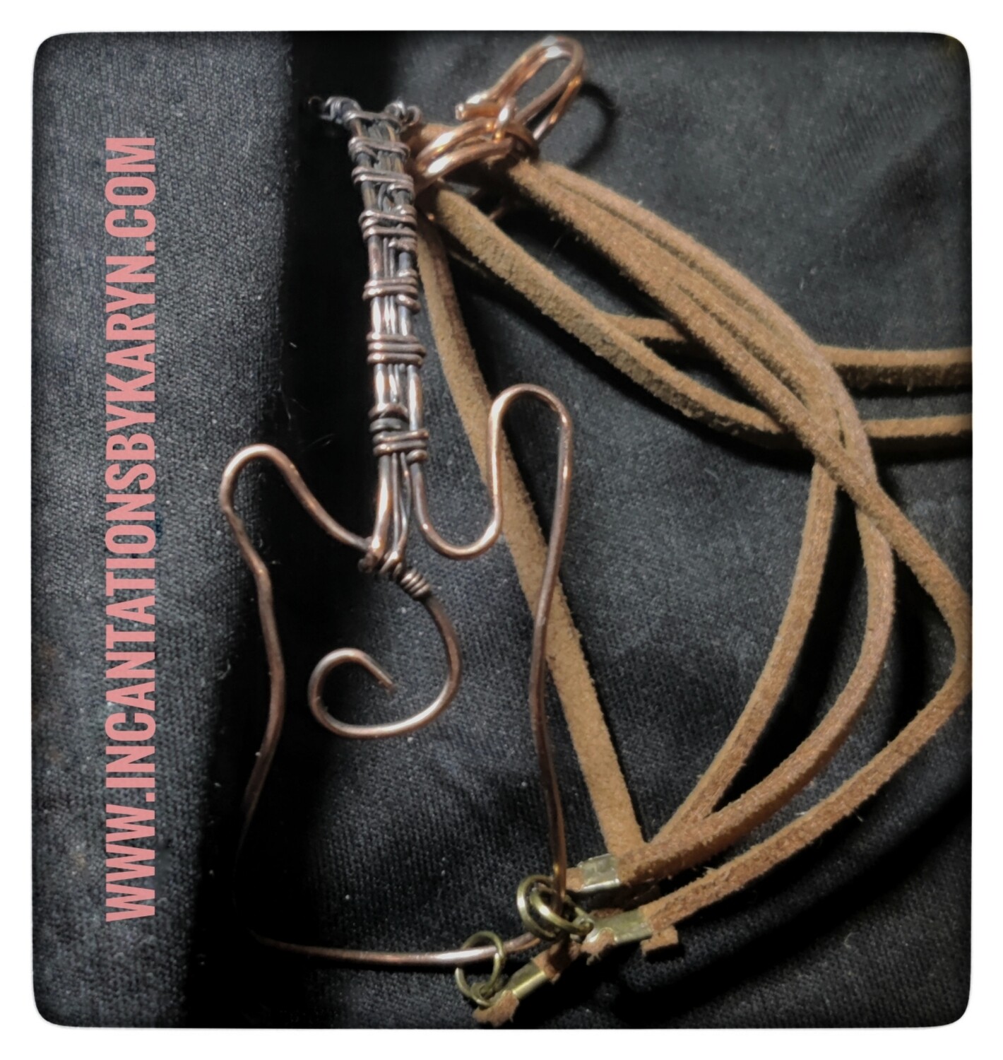 Wire guitar bracelet w/leather strap
