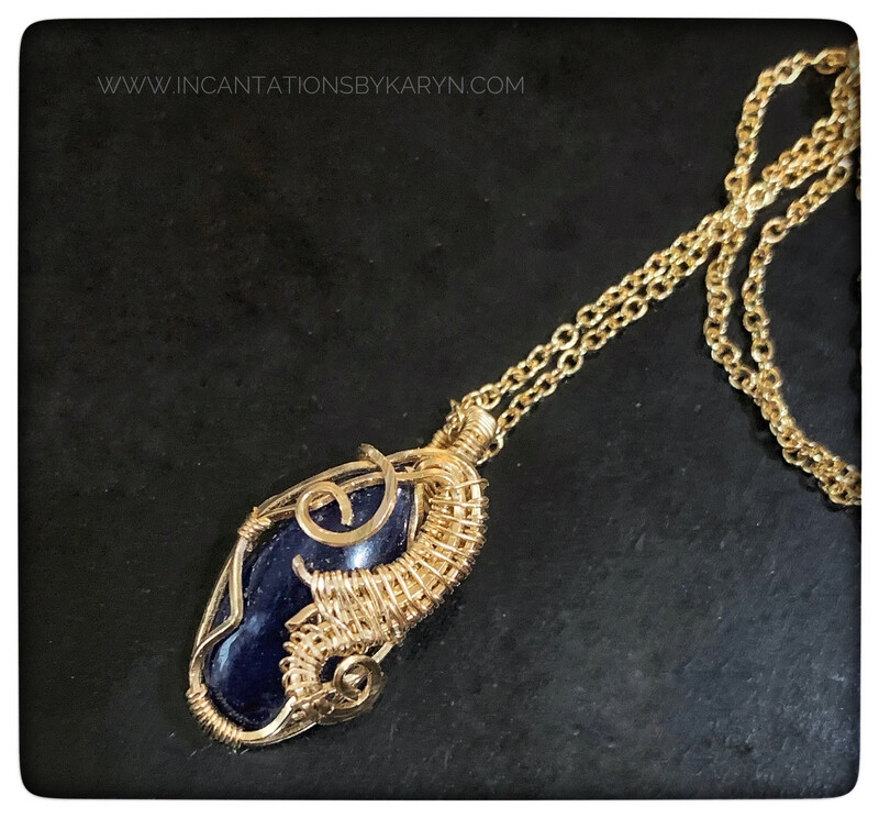 Lapis pendant wrapped in 14k gold fl