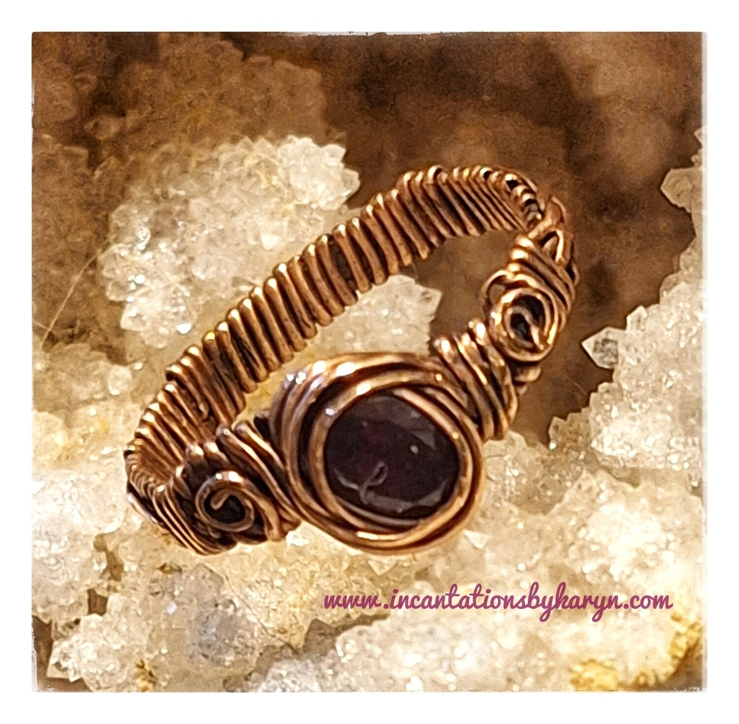 Garnet braided band ring