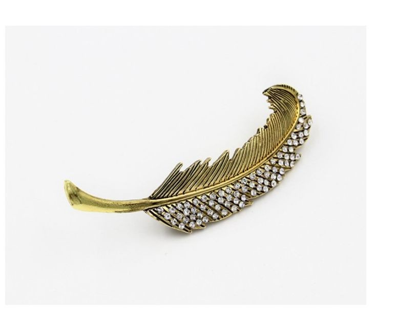Gems studded feather hair barrette Gems studded feather hair barrette
