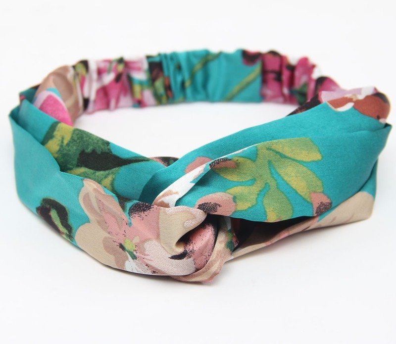 Twist front floral satin elastic headband Twist front floral satin elastic headband