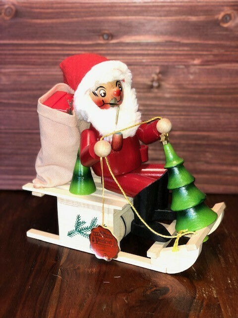 Santa on a Moving Sleigh Smoker Music Box Santa on a Moving Sleigh Smoker Music Box