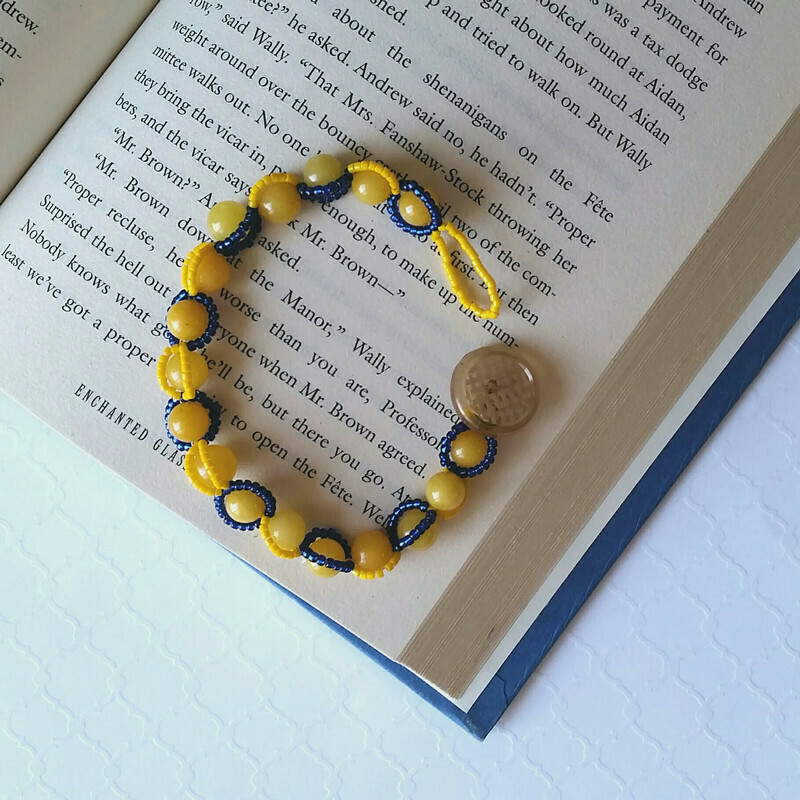 Two Tone Button Closure Bracelet