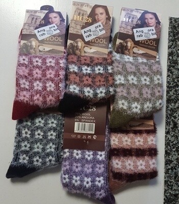 Angora Socks - made from the combed-out fibre of the long coated fluffy angora rabbit. Luxuriously soft & durable. Priced at only $6.99 a pair. They should be $10/pair. Small/ladies sizing Angora Socks - made from the combed-out fibre of the long coated fluffy angora rabbit. Luxuriously soft & durable. Priced at only $6.99 a pair. They should be $10/pair. Small/ladies sizing