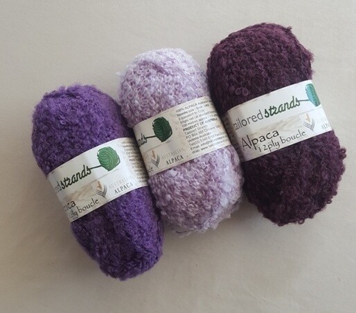 Boucle 12ply "Purple-mauves". Minimum 20% discount for 50grams "mohair-look" 100% Australian alpaca yarn -twilight lavender, wisteria(light mauve)or bilberry. Ideal in jumpers,jackets,rugs,blanketing.