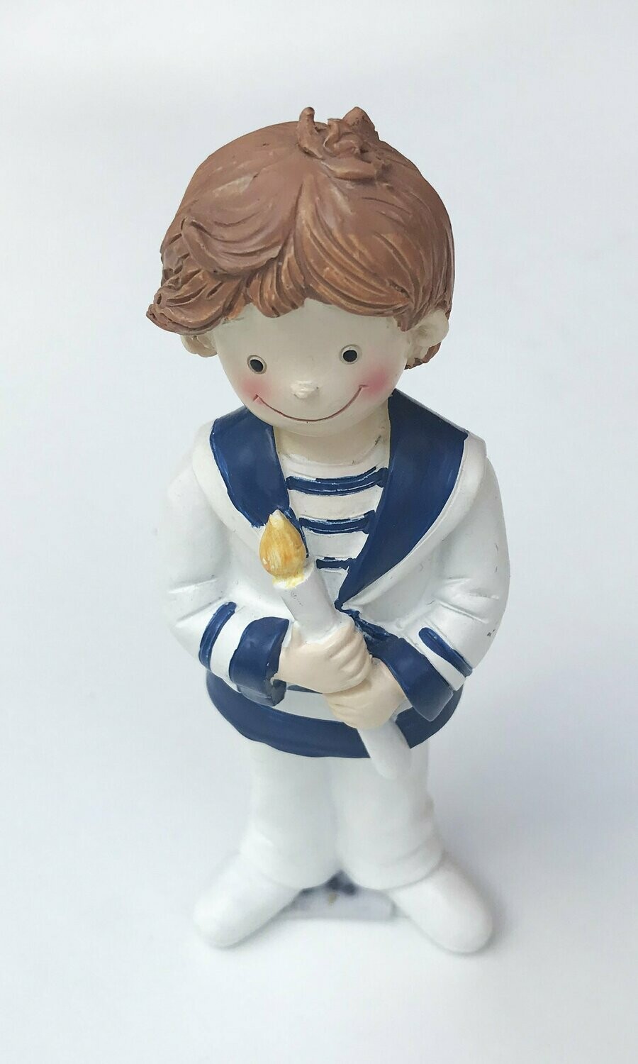 Figura niño comunión con cirio