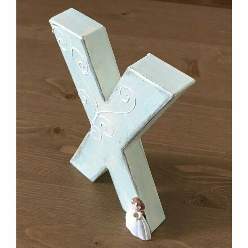 Inicial decorada con figurita