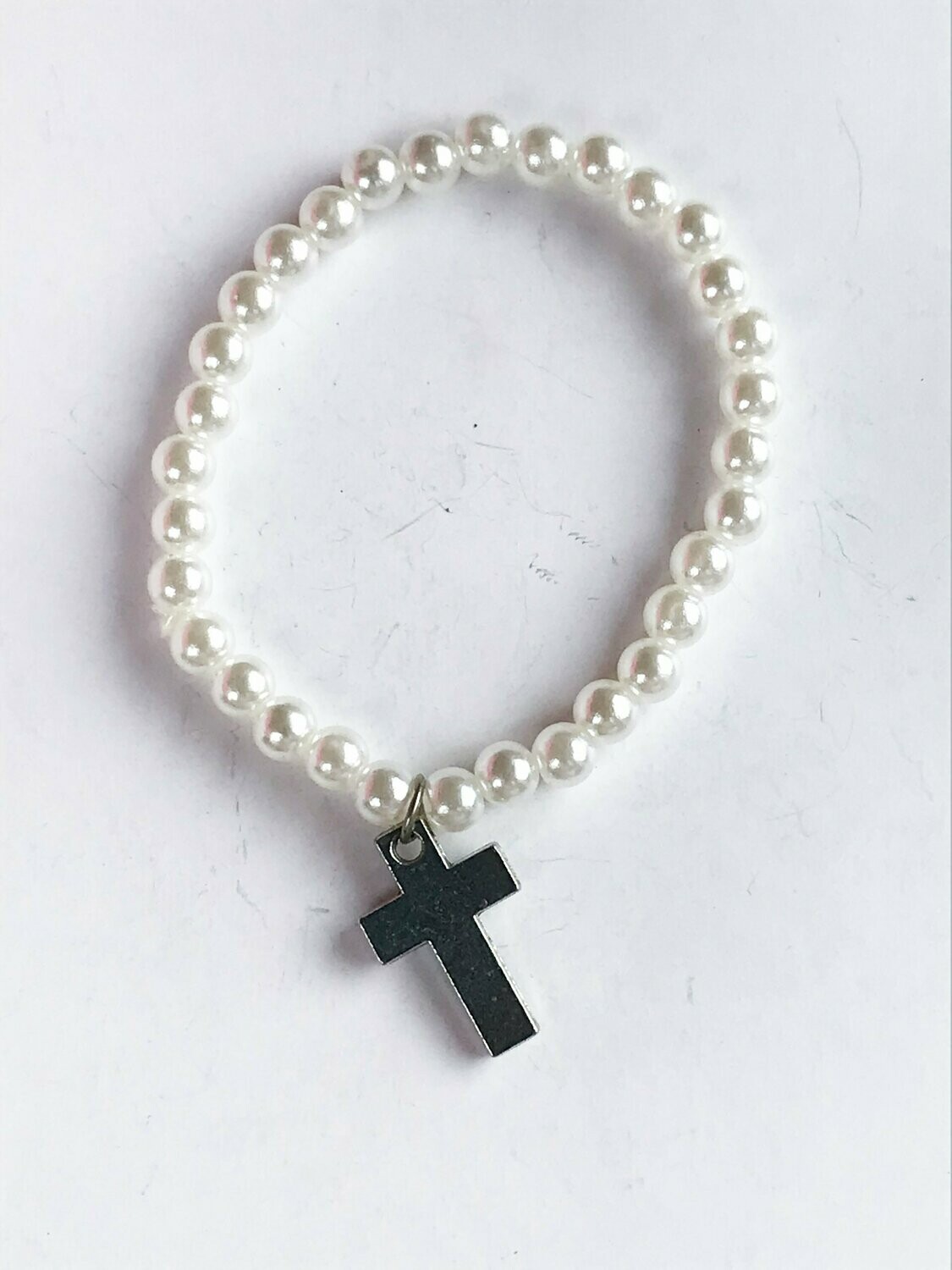 Pulsera perlas y cruz