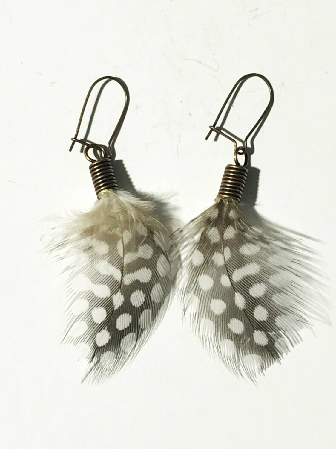 Pendientes de plumas
