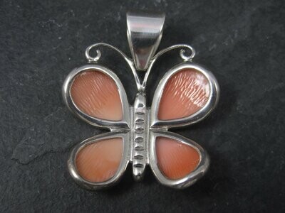 Sterling Carved Angel Skin Coral Butterfly Pendant