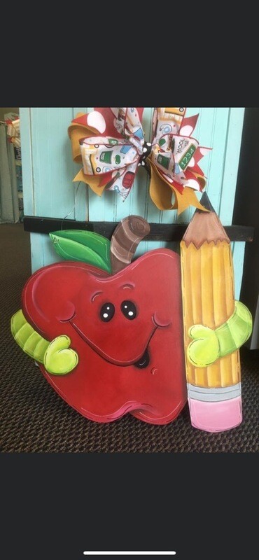 School Apple Holding a Pencil