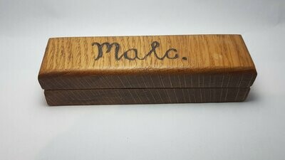 Magnetic oak pen case.