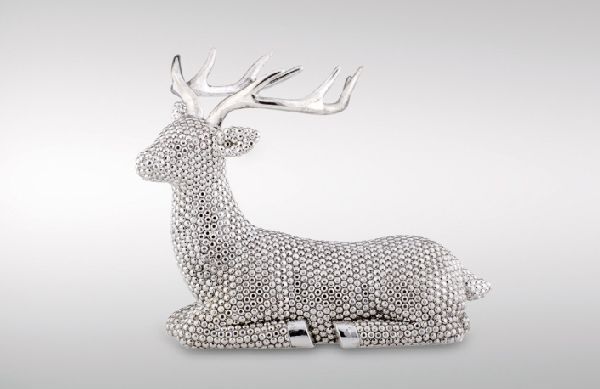 Rentier groß liegend links blickend HxBxT 19 x 6 x 25 cm Rentier groß liegend links blickend HxBxT 19 x 6 x 25 cm