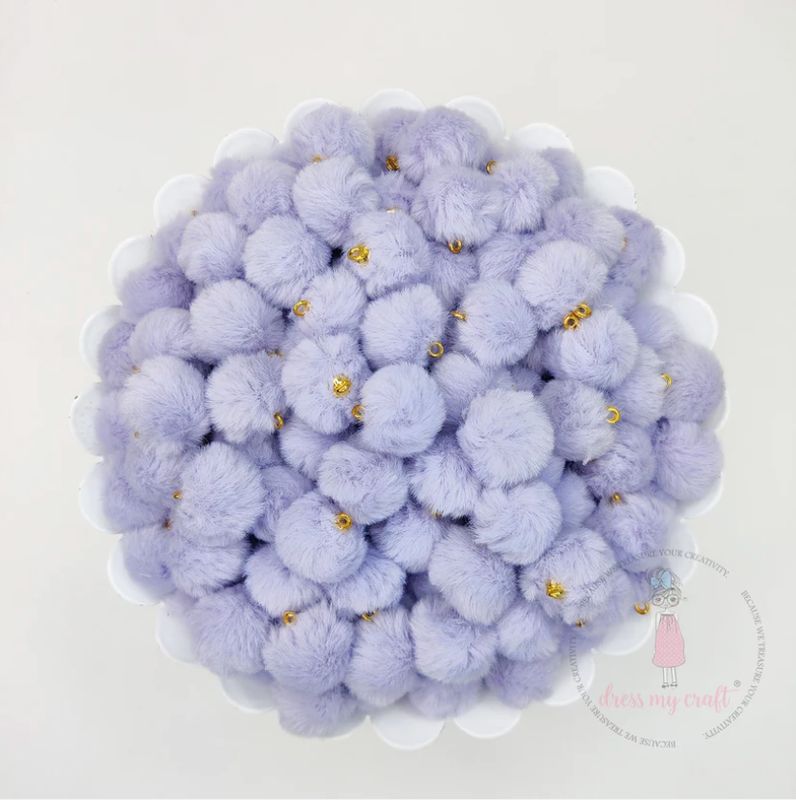 POMPONES EN TONOS PASTEL MALVA
