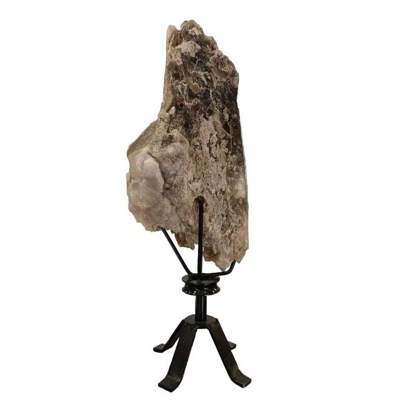 Smokey Quartz point on rotating stand Smokey Quartz point on rotating stand