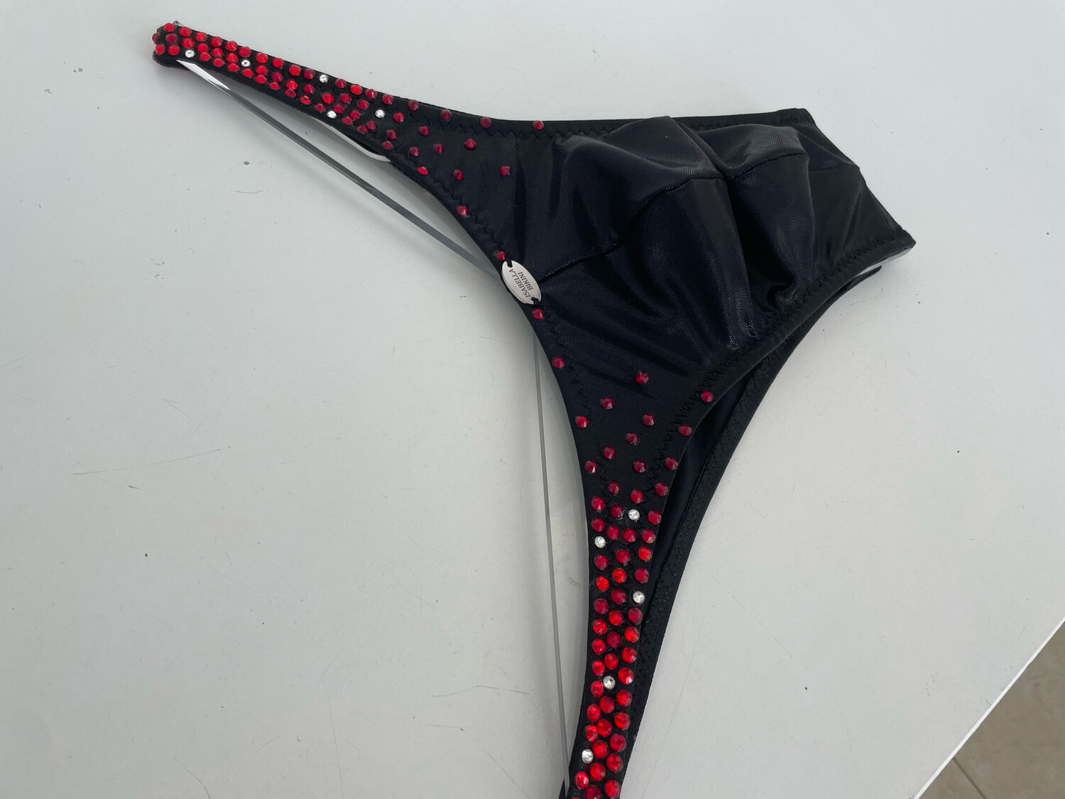 Black Trunks with red stones