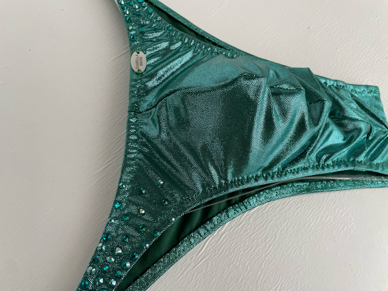 Green metallic Trunks with stones
