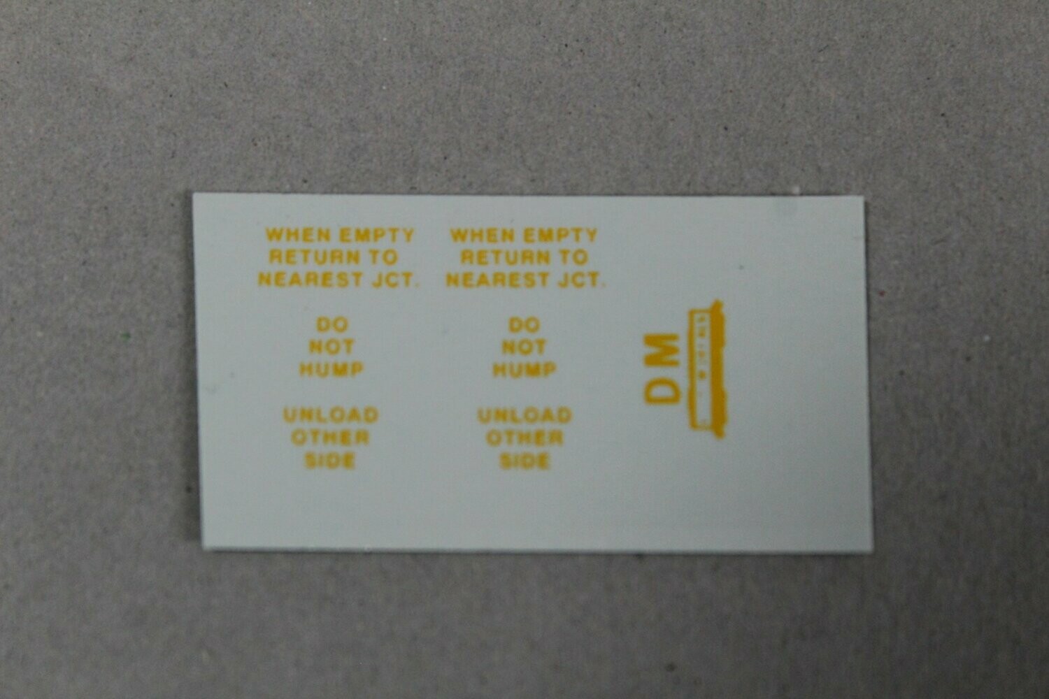 3" Yellow lettering ,unload other side, do not hump, when empty return to