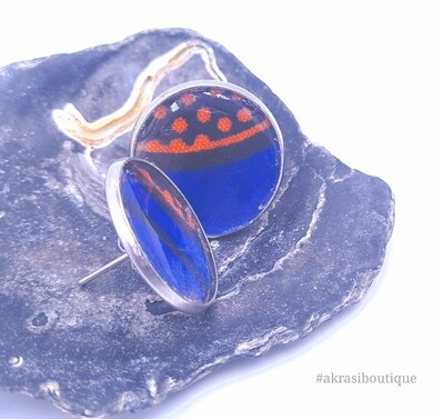 Round blue and orange nkara silver stud earrings sealed in resin