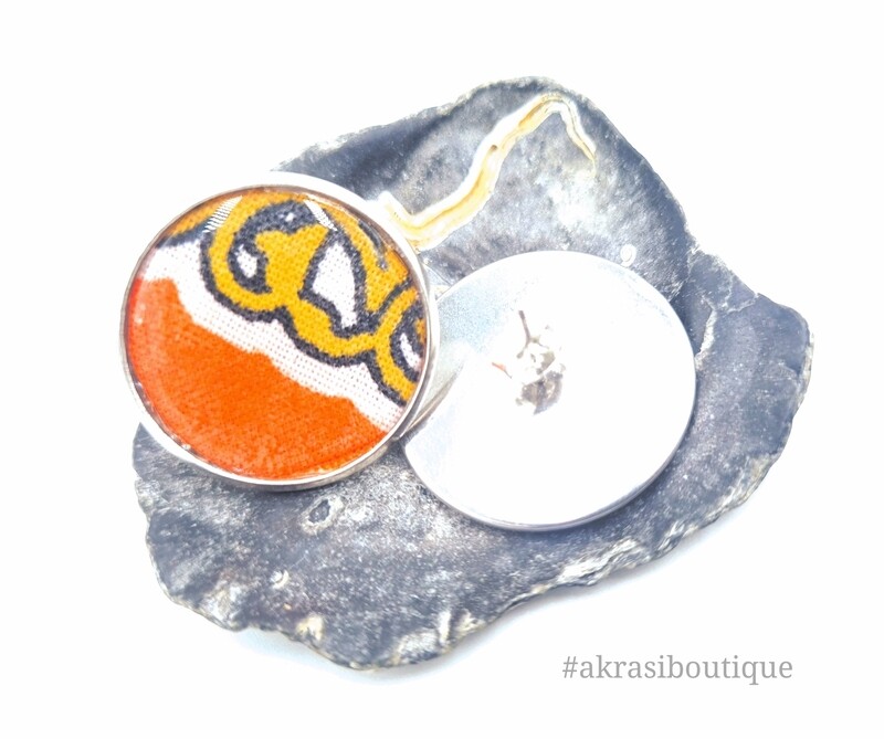 Round orange dashiki silver stud earrings sealed in resin
