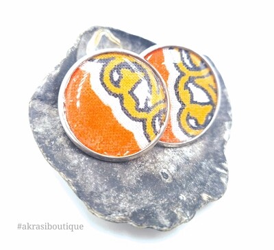 Round orange dashiki silver stud earrings sealed in resin