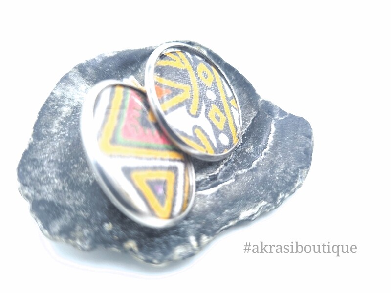 Round yellow dashiki silver stud earrings sealed in resin