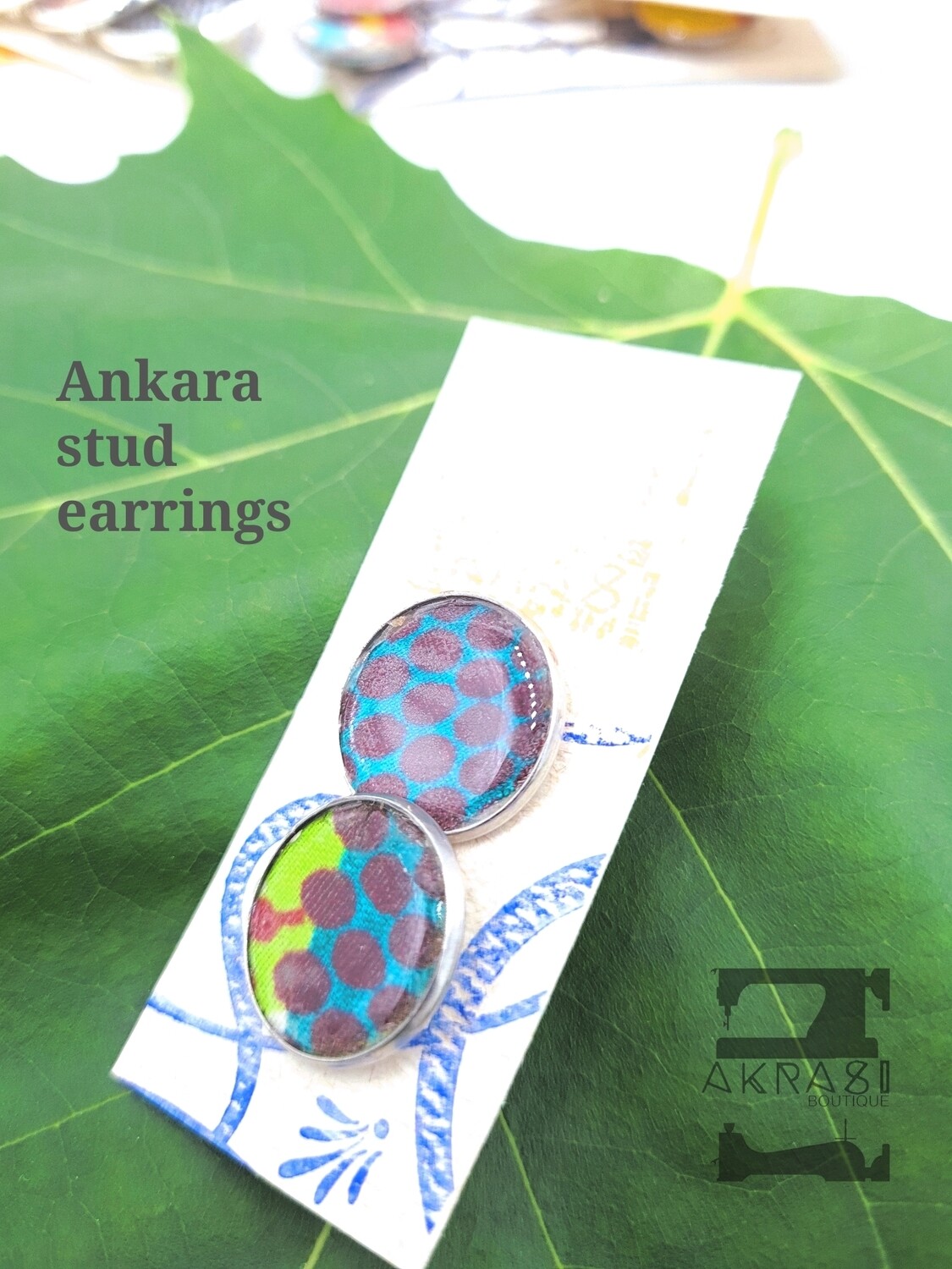 Round green, purple and blue ankara silver stud earrings sealed in resin