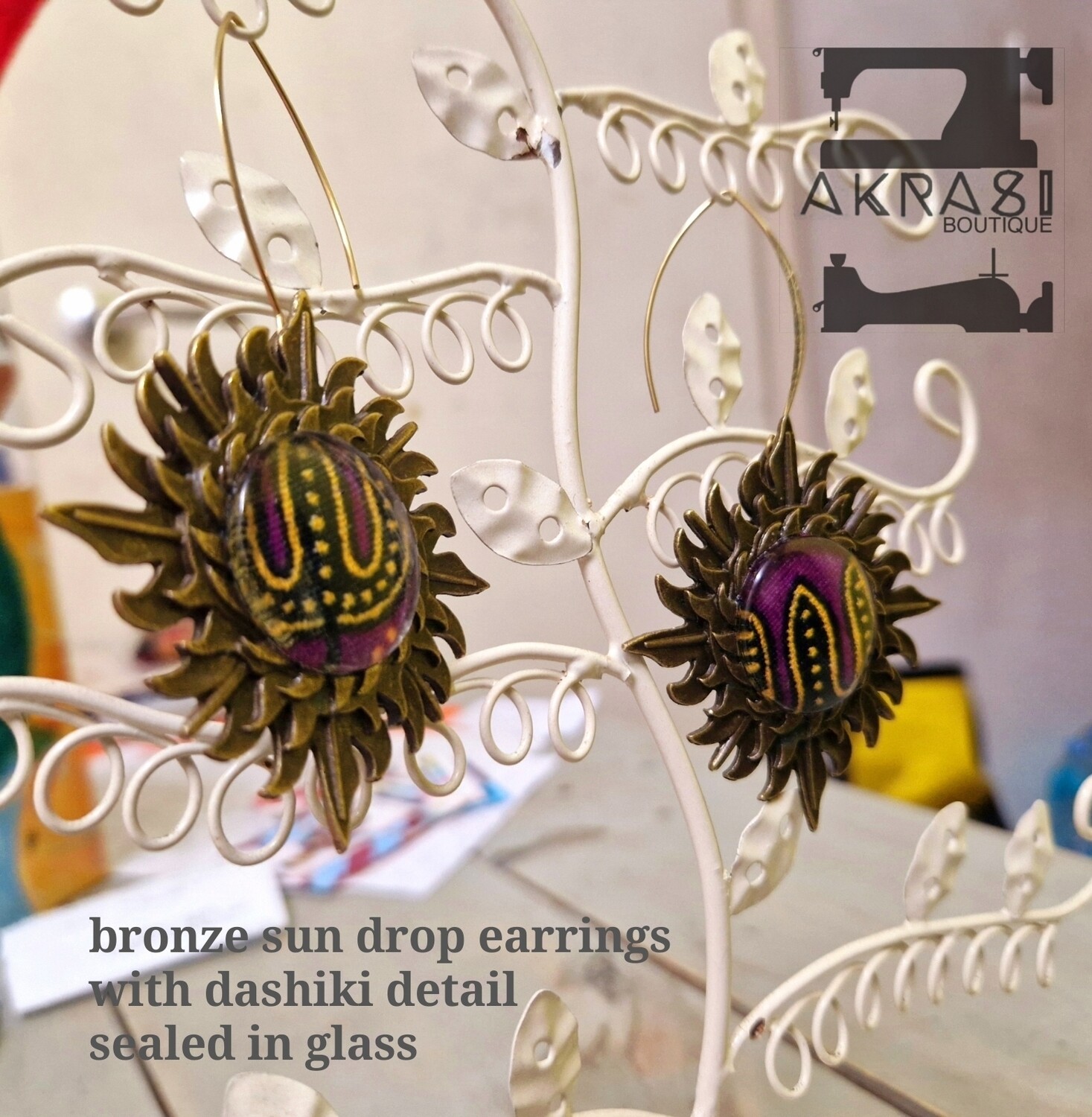 Custom handmade bronze drop earrings with dashiki detail for Esther