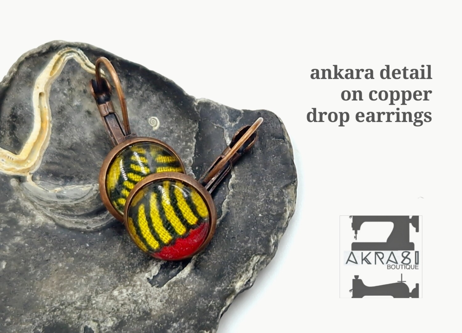 Red and yellow ankara on round copper drop earrings