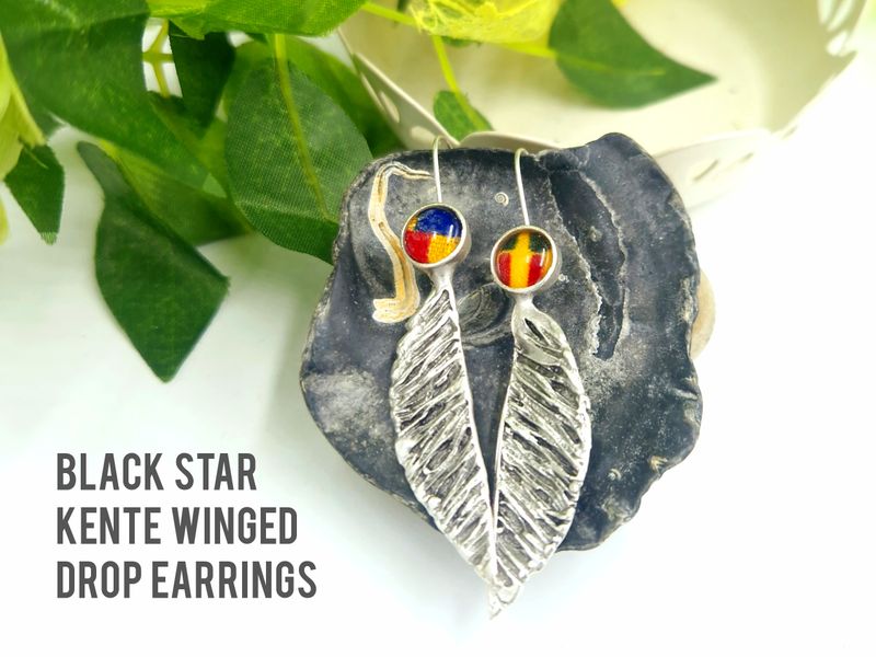 Antique silver black star kente winged drop earrings