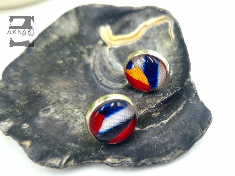 Round kente in white, red and blue on silver stud earrings sealed in glass