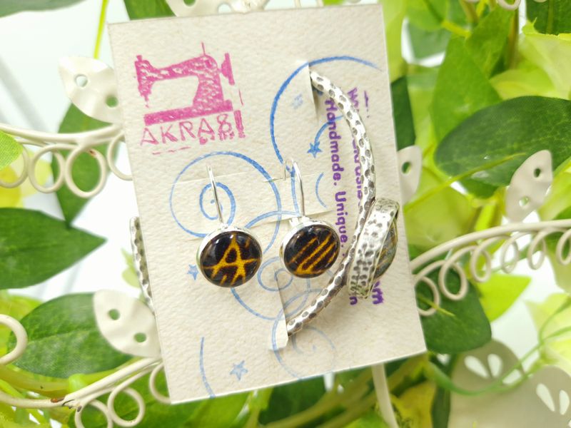 Ankara alchemy collection accessory set includes silver bracelet and matching drop earrings