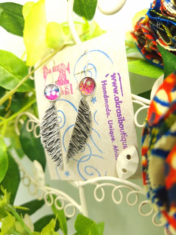 Antique silver black star ankara winged drop earrings