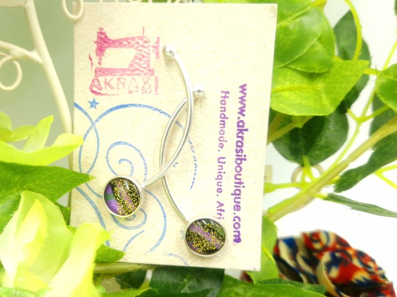 Curved silver stud earrings sealed in glass