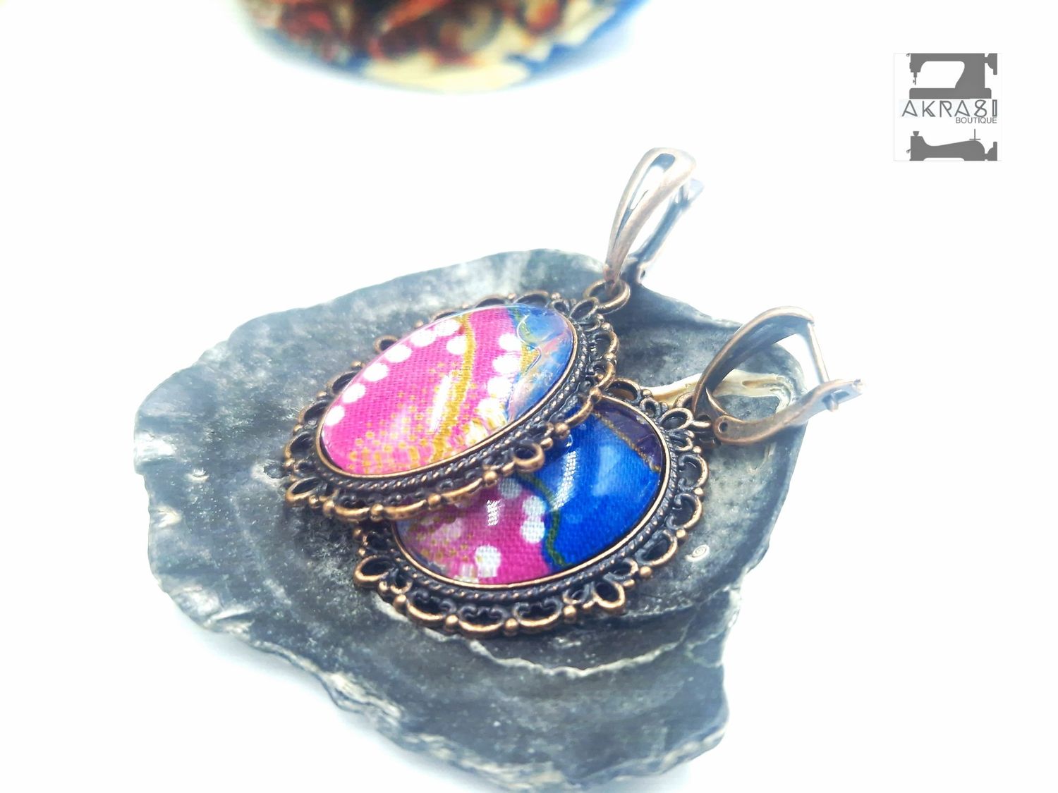 Oval kente copper drop earrings sealed in glass Oval kente copper drop earrings sealed in glass