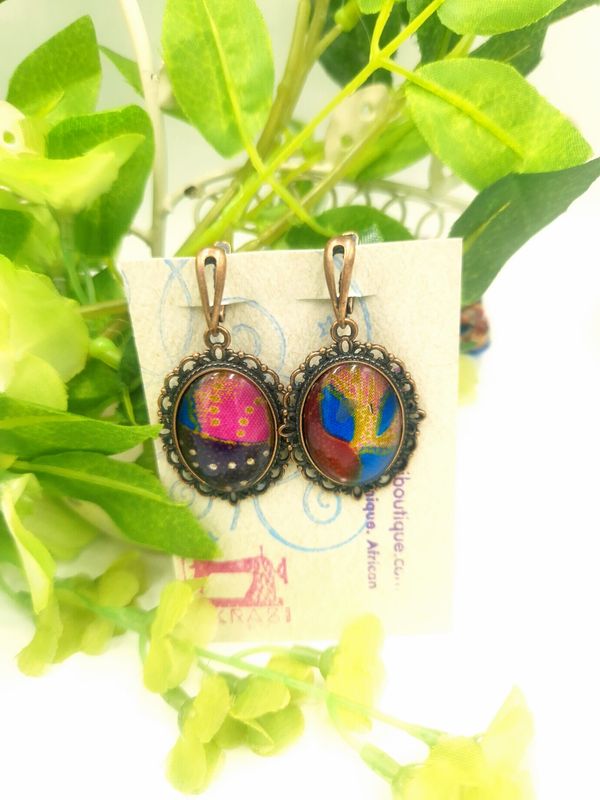 Oval kente copper drop earrings sealed in glass