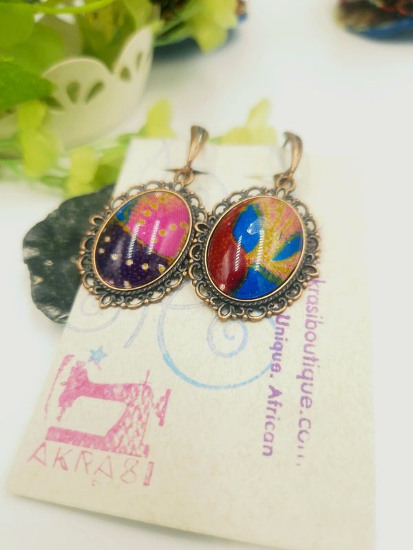 Oval kente copper drop earrings sealed in glass