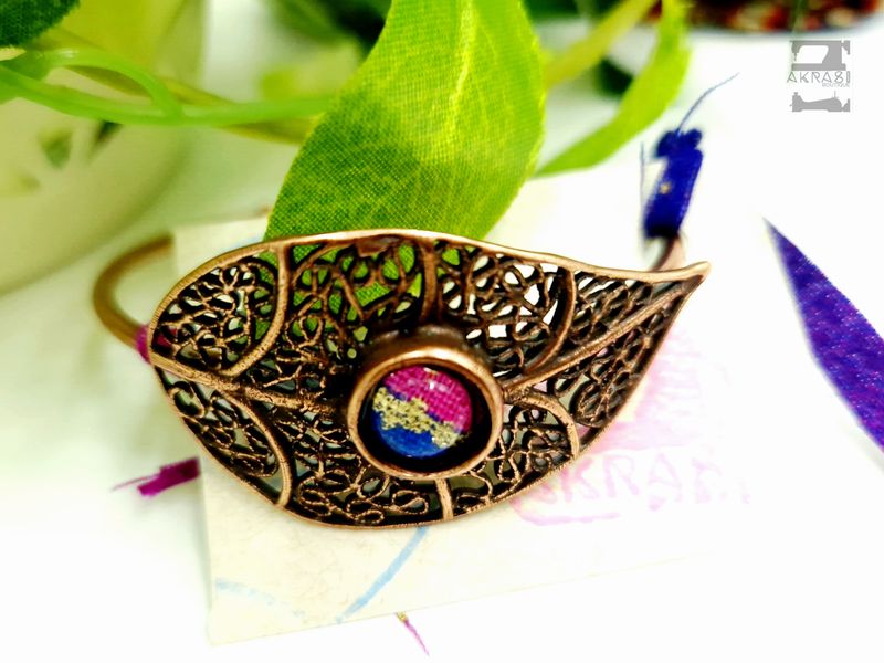 Wax print detail on copper bracelet Wax print detail on copper bracelet