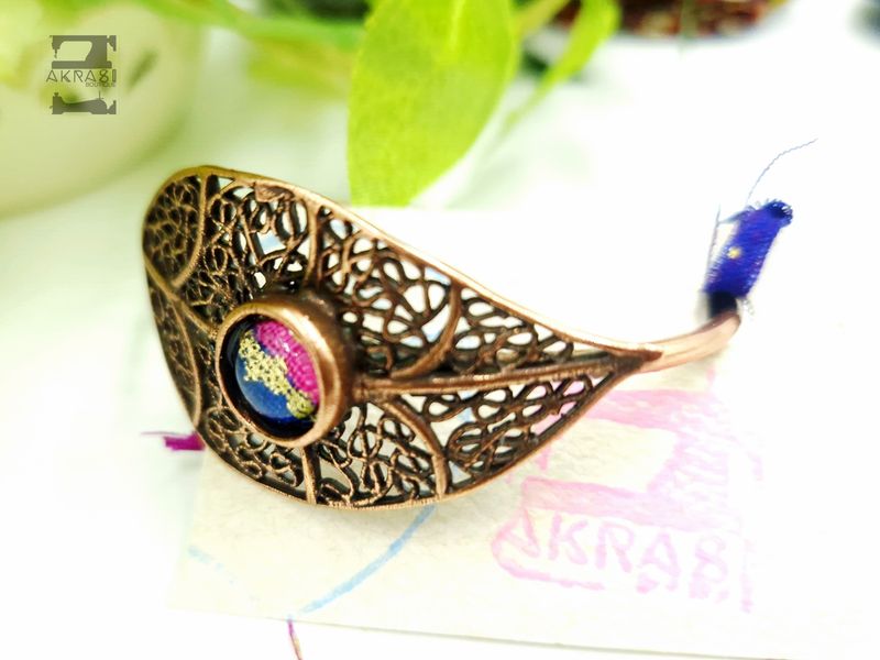 Wax print detail on copper bracelet