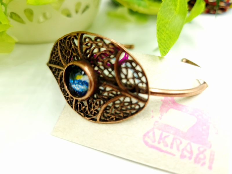 Wax print detail on copper bracelet Wax print detail on copper bracelet