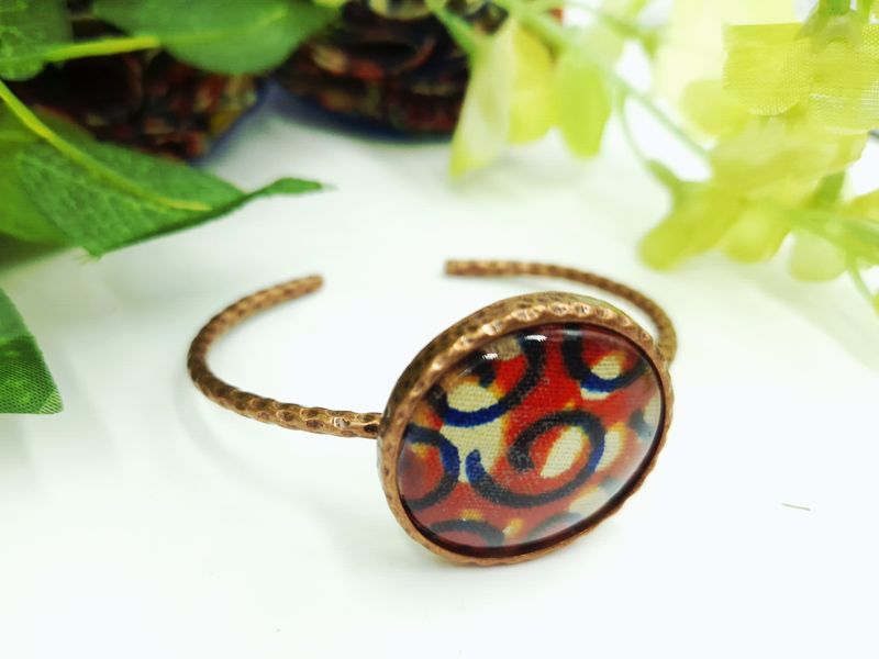 Wax print detail on copper bracelet