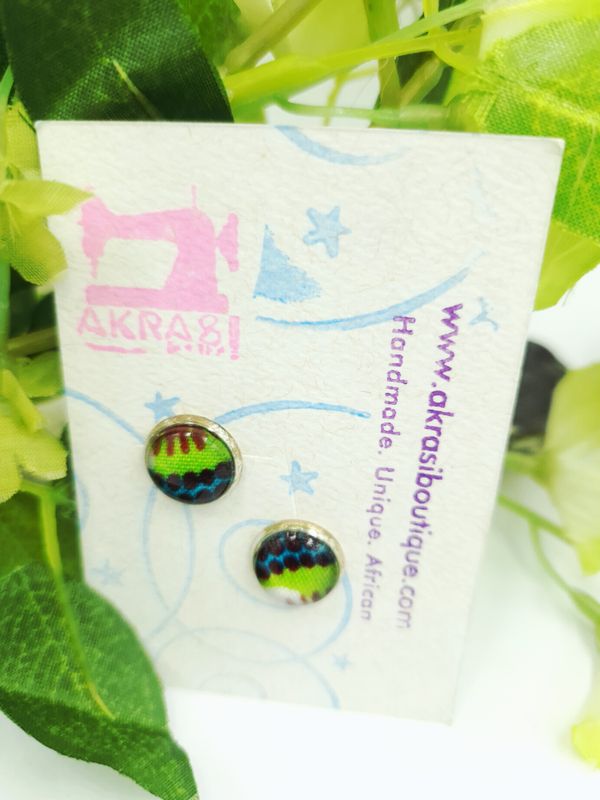 Round kente in green, red and black on silver stud earrings sealed in glass